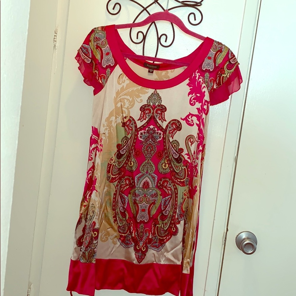 Bebe dress with artsy detail.